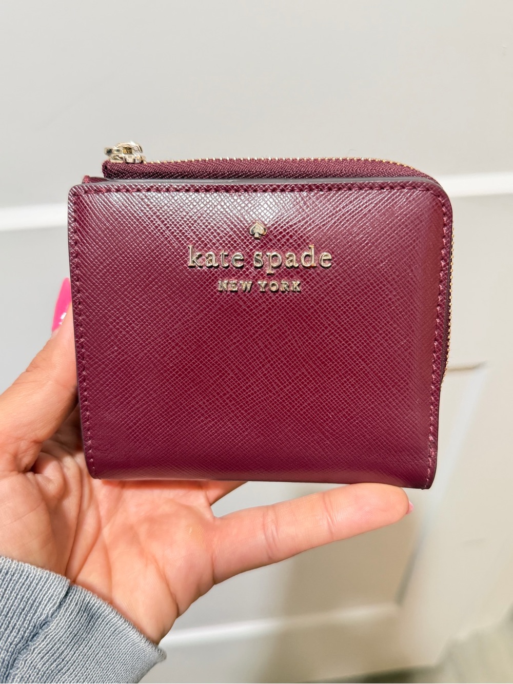 kate spade Plum Saffiano Zip-Around Compact Wallet with Gold Logo